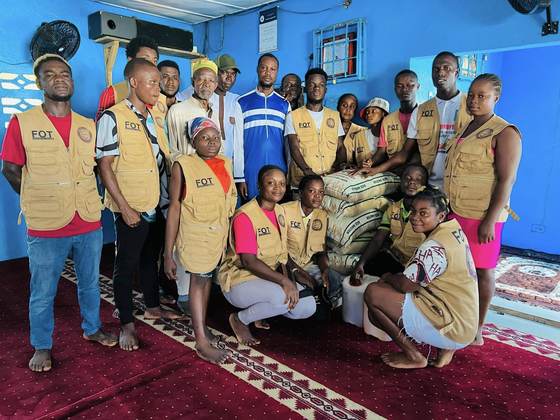 Volunteers with food supplies ready for distribution